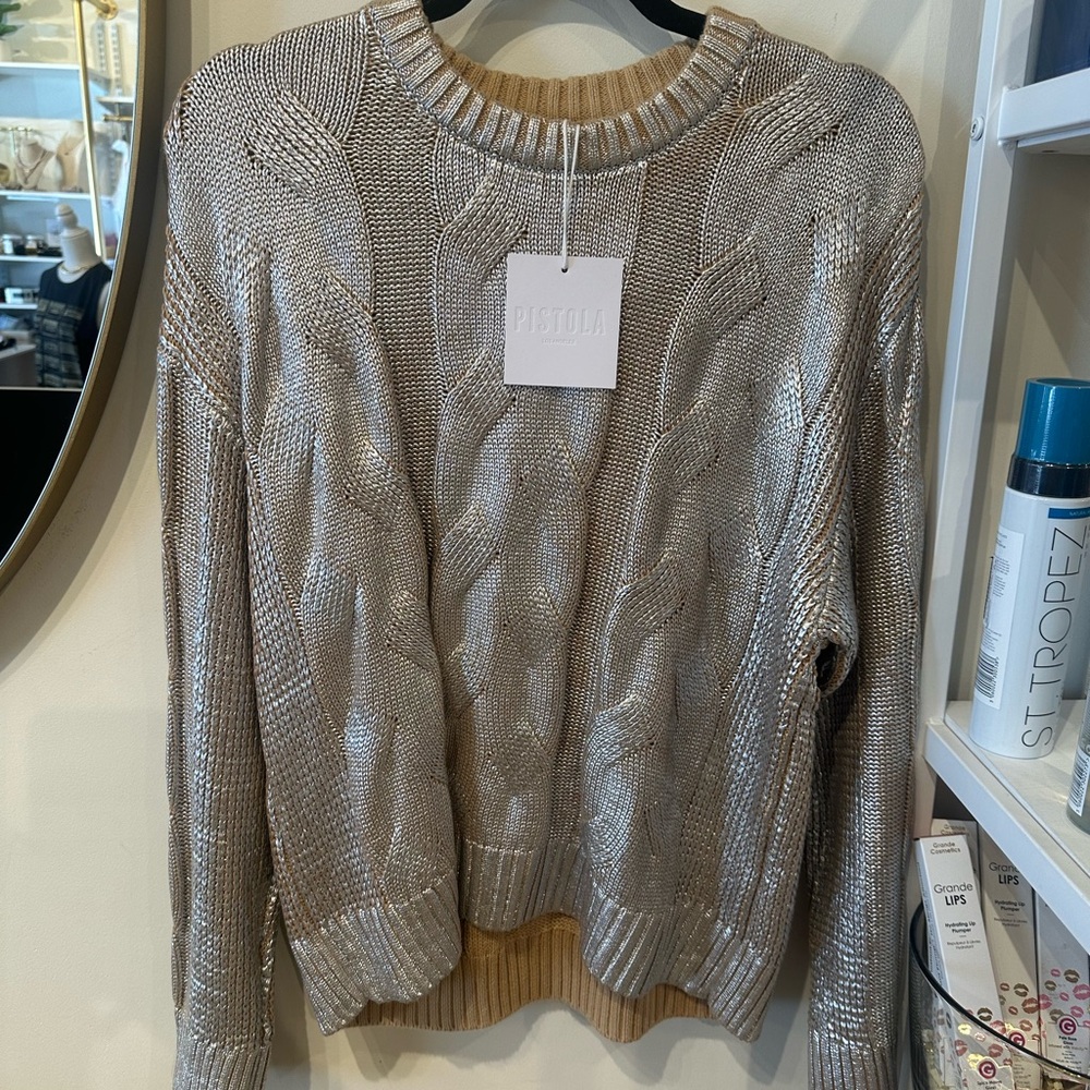 Pistola , this is the greatest sweater !! it’s sold out so fast.